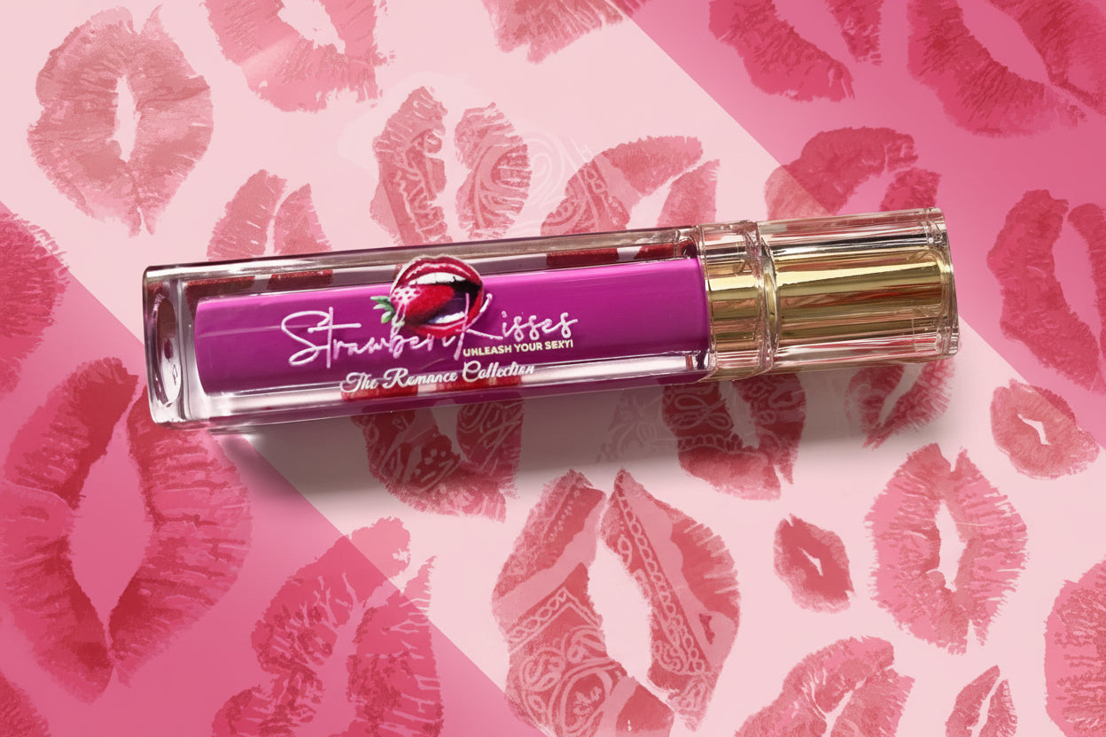Lip balm with 'Strawberry Lashes' branding on a background of red lip prints