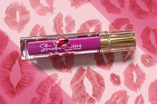 Lip balm with 'Strawberry Lashes' branding on a background of red lip prints